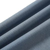 Tissu antistatique à carreaux FR avec une résistance à l'usure supérieure et des performances respirantes pour les vêtements de travail de sécurité industrielle