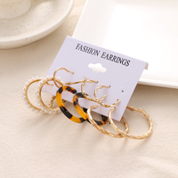 KISSWIFE Boucles d'oreilles tendance en métal torsadé avec perles, boucles d'oreilles créoles en résine léopard, boucles d'oreilles à clous papillon, ensemble de boucles d'oreilles