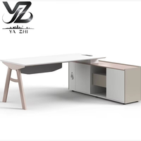 Bureau de direction moderne en L Yazhi pour cadre dirigeant/directeur de service, en PVC, avec boîte à câbles amovible, livraison directe usine