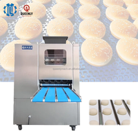 Chaîne de production de pains à pizza : Machine automatique de division et de façonnage de pâtes pour une efficacité accrue, idéale pour l'industrie des snacks.