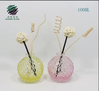 Huile essentielle de bouteille en verre de forme d'ananas de la conception unique 100ml pour le diffuseur pour l'emballage cosmétique avec la couleur adaptée aux besoins du client