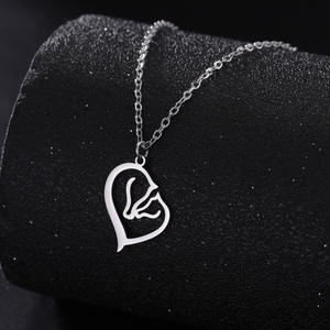 Bijoux en acier inoxydable <span class=keywords><strong>de</strong></span> haute qualité élégant or argent coeur creux <span class=keywords><strong>dessin</strong></span> <span class=keywords><strong>Simple</strong></span> collier pendentif <span class=keywords><strong>cheval</strong></span> à Double tête - Product Image 6