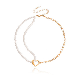 Bijoux européens et américains de vente chaude INS Creative Imitation Baroque Pearl Hollow Heart Pendant pour les femmes Niche Necklace - Product Image 6