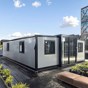 บ้านคอนเทนเนอร์เหล็กสำเร็จรูปขนาด 40 ฟุต แบบขยายได้ สำหรับใช้เป็นสำนักงาน อาคารพักอาศัย โรงเรียน ห้างสรรพสินค้า ห้องครัว อพาร์ทเมนต์ โรงงาน - Product Image 1