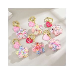 Acrylic Kawaii Flower Liquid Keychain Creative Cute Quicksand Flower <b>Floating</b> Liquid Key Chain Bag Charm Pendant - Product Image 1