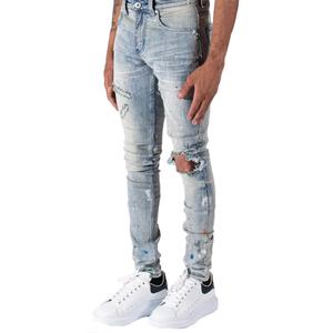 กางเกงยีนส์เดนิมทรงสลิมฟิตสีฟ้าอ่อนแบบมีรอยขาดที่เข่าและลายเพ้นท์สำหรับผู้ชาย - Product Image 3