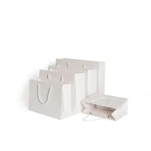 Sacos de papel personalizados, nova fábrica de sacos de papel portáteis com logotipo personalizado, engrossado, elegante, presente para o vento, bolsas de papel genérico