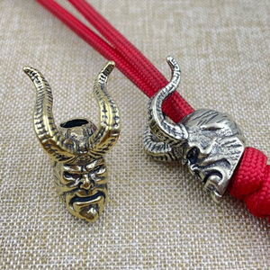 Sculpture de tête de <span class=keywords><strong>Hellboy</strong></span> à cornes en laiton, perles de couteau, accessoires pour extérieur, EDC, DIY, paracorde, pendentifs de lampe torche, breloques de bijoux - Product Image 1