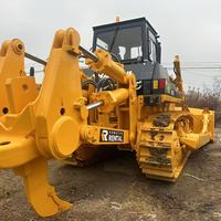 Bulldozer SHANTUI d'occasion, chenilles jaunes, équipement de construction robuste avec lame de nivellement, système hydraulique, moteur, roulement, pompe