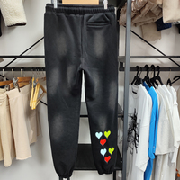 Pantalon de survêtement personnalisé en molleton bouclette avec broderie et effet empilé pour homme
