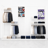 Système d'affichage de vêtements en métal noir pour armoire ouverte, étagères de rangement pour vêtements, présentoir de magasin de détail OEM