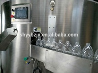 Machine de déballage automatique électrique pour ligne de production d'eau minérale avec emballage en bois, sécurité et économie d'énergie