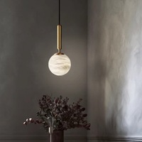 Suspension minimaliste en marbre alabastre veiné mat, globe sphérique de luxe en pierre, luminaire LED suspendu pour hôtel