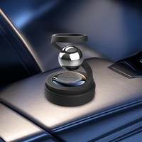 Accessoire de parfum de voiture de haute qualité avec énergie solaire et système de diffusion d'aromathérapie rotatif
