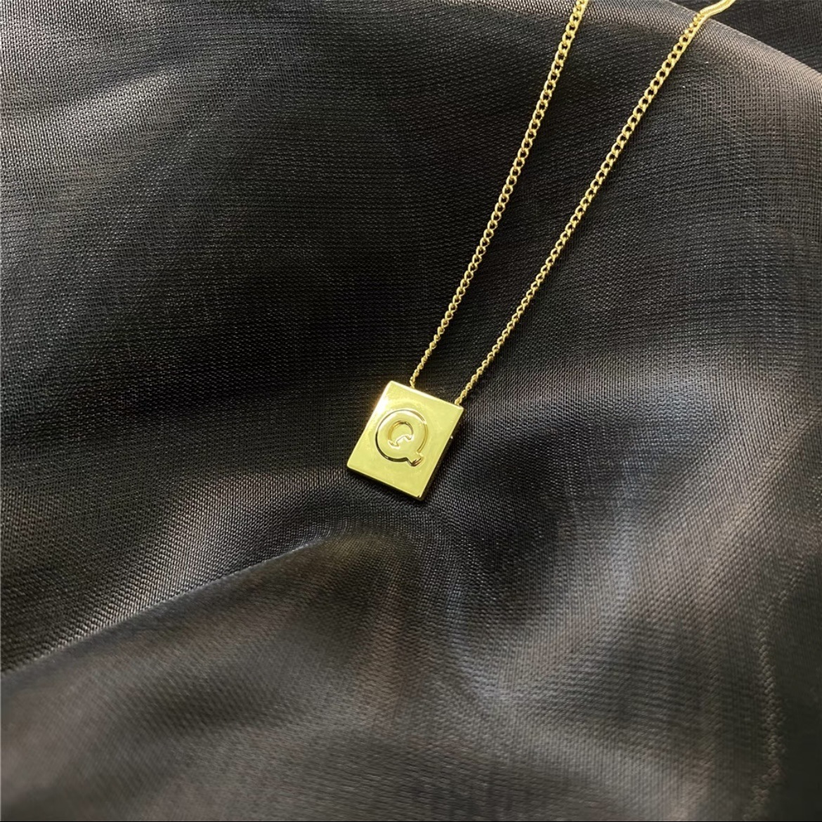 Q