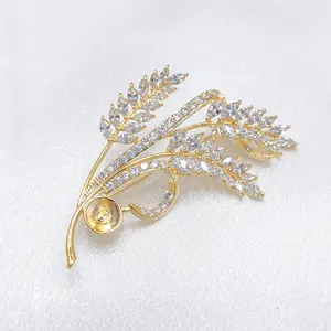 Il pavone dorato all'ingrosso diretto della fabbrica non ha spille di gioielli di moda con spilla di perle fai da te