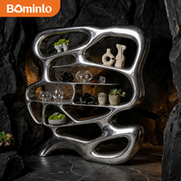 Étagère sculpturale irrégulière en acier inoxydable poli miroir, étagère d'exposition d'art moderne de luxe pour la décoration de la maison, de l'hôtel et de la villa