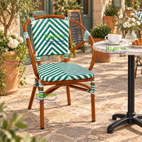 Fauteuil HappyLife en rotin tressé vert et blanc à chevrons, aspect bambou, style bistrot français