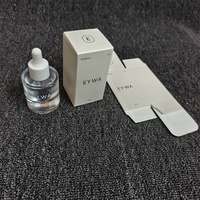 Boîte cosmétique personnalisée en carton blanc avec logo en relief, boîte d'emballage en papier pliable pour sérum en flacon compte-gouttes de 30 ml, huile éclatante