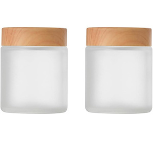 Tarro de Plástico PET Transparente/Ámbar Esmerilado Natural de Lujo al por Mayor de 150g/250g para Mantequilla Corporal y Crema para Ojos con Tapa de Bambú - Product Image 1