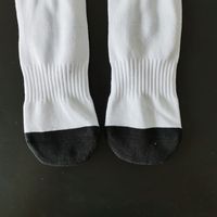 High Crew Style décontracté Polyester blanc épais Sublimation chaussettes vierges respirant bas corps Logo Position pour la saison de printemps Non