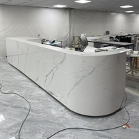 Comptoir de réception moderne en granit blanc poli, surface solide, garantie 10 ans, pour hôtel et service d'accueil