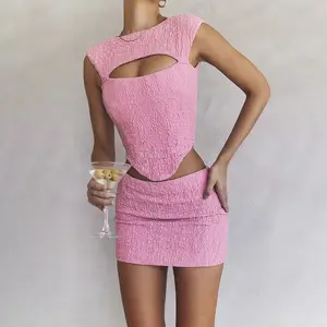 Ocstrade Jacquard váy màu hồng và thiết lập hàng đầu cho phụ nữ ropa de mujer không tay Rỗng ra eo hàng đầu chặt chẽ quấn hip váy ngắn Bộ