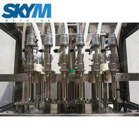 Ligne de remplissage d'huile d'olive de bouteille PET de Type linéaire automatique SKYM Machine de remplissage d'embouteillage d'huile comestible 5 L 10L 20L