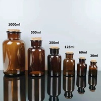 Bouteilles de pharmacie en verre de style vintage brun ambré avec bouchon en liège, col large et forme plate