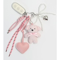 Porte-clés de luxe en forme d'ours en peluche avec nœud, mini pendentif animal en cuir en forme de cœur, accessoire de sac pour femme avec corde tressée
