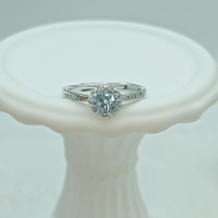 Bague de fiançailles et de mariage tendance en argent sterling 925 avec halo de cercles concentriques incrusté de zircon bleu et sertissage pavé
