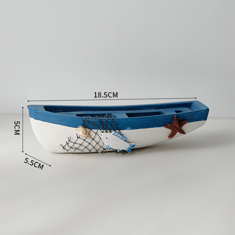 Petit bateau, bleu profond
