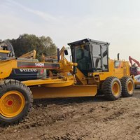 Niveleuse Caterpillar 140H d'occasion en excellent état, modèle 2022, pour la construction routière, avec moteur, pompe et boîte de vitesses disponibles à la vente