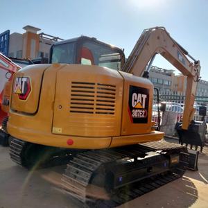 Mini-excavatrice sur chenilles hydraulique Caterpillar 307E2 d'occasion, modèle 2024, pour la construction et l'agriculture, 95% NEUVE, 7 tonnes, avec CE/EPA - Product Image 1