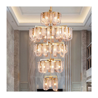 Lustre en acier inoxydable doré personnalisé, moderne et luxueux, avec cristaux LED, pour hôtel, escalier, plafond, avec garantie de 3 ans