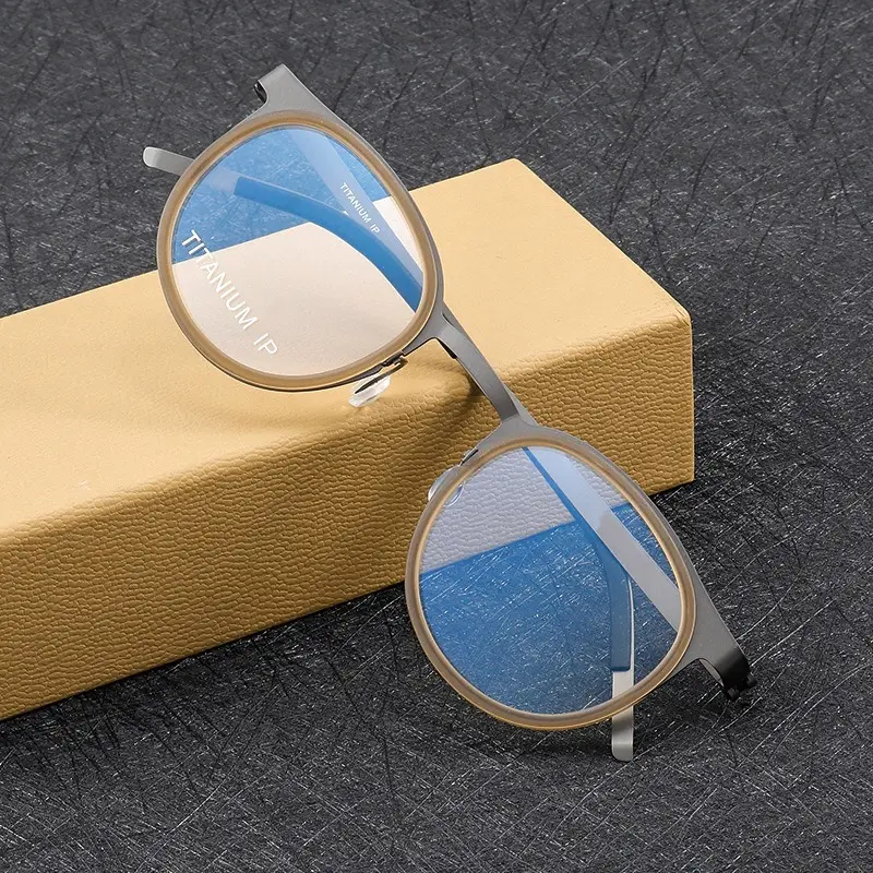 Yüksek kalite özel logo titanyum gözlük erkekler gözlüklü erkekler için okuma gözlüğü yeni Trendy titanyum yuvarlak optik gözlük çerçeveleri