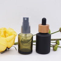 1 once épaule inclinée vert olive 30ml flacon compte-gouttes rond avec fermeture de pompe à Texture en bois foncé