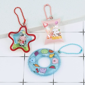 Personnalisé Acrylique Charmes Pendentif PVC Gonflable Puffed Air Natation Anneau <span class=keywords><strong>Piscine</strong></span> Gonflable Anime Shaker Sequin Bonbons Sac Porte-clés - Product Image 1