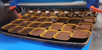 Déposeur de gâteaux automatique pour cupcakes, biscuits, gâteaux mille-feuilles avec eau pour utilisation en boulangerie Machine en acier inoxydable 304 à grande vitesse