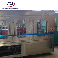 Machine de remplissage 99 % neuve à 24 têtes, contrôlée par PLC, haute performance, 12 000 bph pour bouteilles en plastique, eau pure et boissons