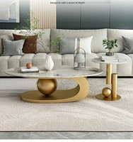 Table basse ovale de luxe de haute qualité avec plateau en pierre frittée, style moderne et simple, pour salon italien.