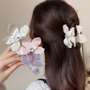 Pince à cheveux élégante en acétate motif floral pour filles, pour chignon, avec une touche féminine pour usage quotidien - Product Image 1