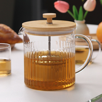 Théière en verre borosilicate transparent avec couvercle en bambou naturel et filtre amovible pour la préparation du thé, compatible avec le cuisinière et le micro-ondes