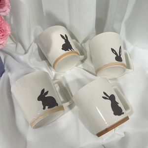 แก้วพอร์ซเลนสีขาวดีไซน์ใหม่ระดับมืออาชีพ ของขวัญทางธุรกิจ ลายกระต่ายน่ารัก เคลือบสีเงา คุณภาพพรีเมียม ปรับแต่งได้ - Product Image 1