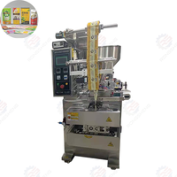 Machine d'emballage verticale automatique de haute qualité en plastique PET pour sachets de sauce soja, miel, lait en poudre, ketchup