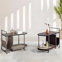 Petit ensemble de tables d'appoint mobiles d'angle, chariot minimaliste italien avec roulettes, en acier inoxydable et cuir de selle, pour entrée
