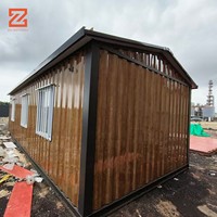 Rumah kontainer prefabrikasi dua lantai 20ft paket datar nenek dapat dilepas untuk rumah kantor untuk penggunaan kabin halaman belakang