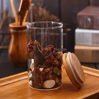 Botes herméticos para alimentos Frascos de vidrio pequeños transparentes con tapas de bambú Contenedores de almacenamiento sellados para alimentos resistentes al calor Frasco de vidrio