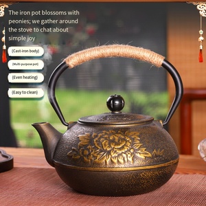 <span class=keywords><strong>ต้ม</strong></span>น้ำชาในเตาทรงกลมพร้อมหม้อเหล็กหล่อลายดอกโบตั๋นแบบจีน ชุดน้ำชาเหล็กหล่อทำมือแบบไม่เคลือบ ของขวัญสุดพิเศษ - Product Image 1
