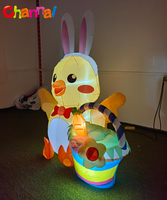 Ornement de jardin gonflable de Pâques : Poussin jaune avec serre-tête oreilles de lapin, panier de fleurs gonflable, carotte et lumière LED